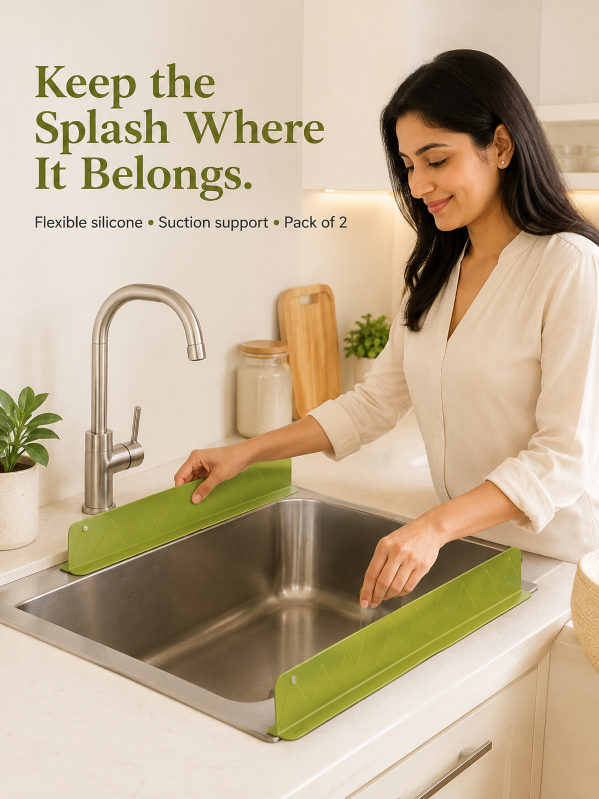 Woman installing the Dry Sink Guard Duo in a modern kitchen